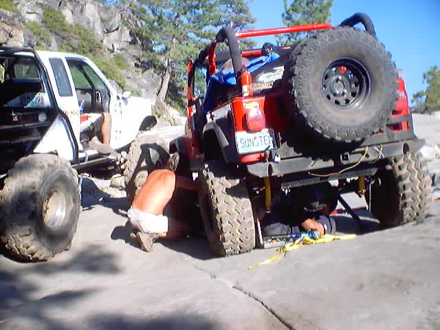 Little Sluce.

The Jeep busted a bolt holding on a traction bar causing the axle tube to turn and the driveshaft to break.