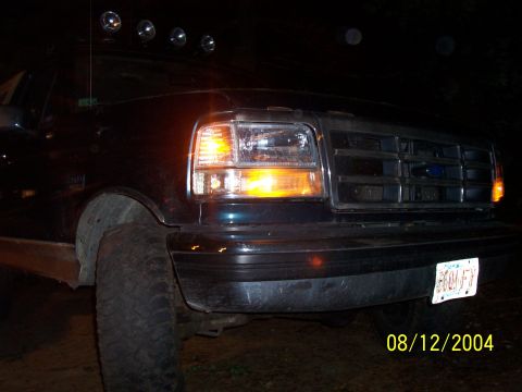 1994 Ford Bronco - Front view of a 1994 Ford Bronco, its distinctive grille and amber turn signals.