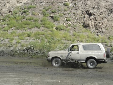 1988 Ford Bronco - Playing in the mud.