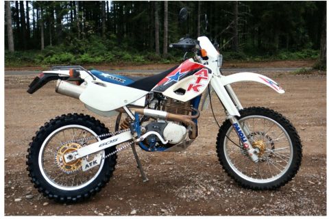 1977 Ford F-150 - ATK dirt bike with "ATK" graphics on the fuel tank and "605" on the chain guard.