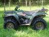 1993 Ford Bronco - An all-terrain vehicle is shown from the side, parked in a grassy area.
