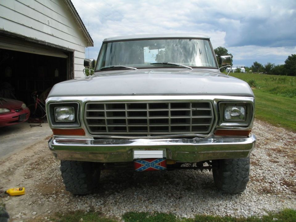 Front view of a silver 1979 Ford F-150 pickup truck with a prominent grille