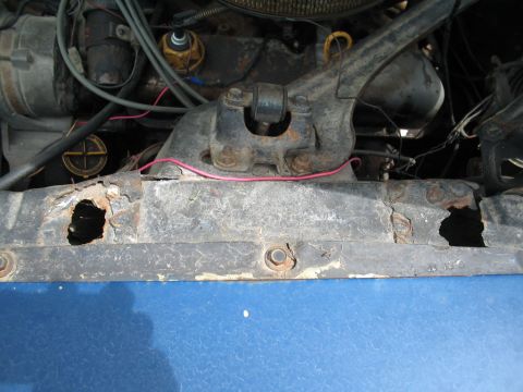 1967 Ford Mustang - This photo shows a heavily rusted car radiator support, not a complete vehicle.