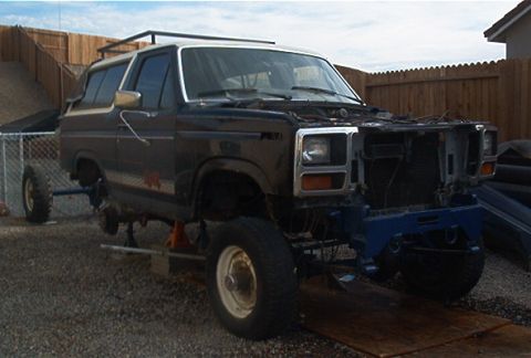 1986 Ford Bronco - This 1986 Ford Bronco is undergoing front-end repairs, lifted on jack stands.