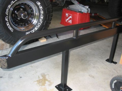 1995 Ford Bronco - Aftermarket rock sliders are shown, not a 1995 Ford Bronco.