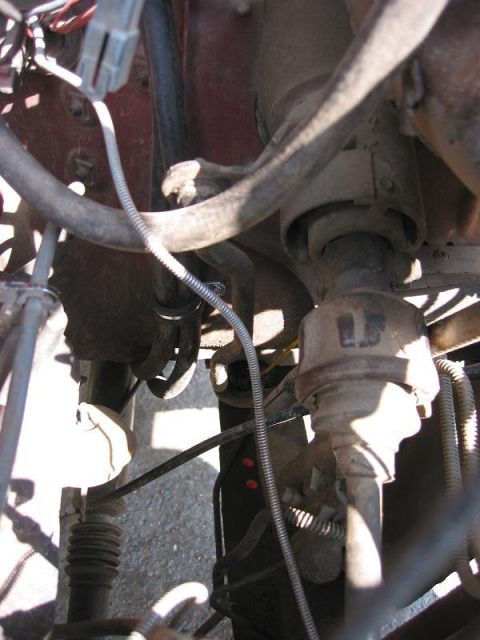 1985 Ford Bronco - Close-up view of the steering column and suspension components on a 1985 Ford Bronco.