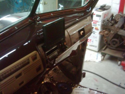 1978 Ford Bronco - A shot of the dash my dad restored and painted. You can see the DVD player inside the radio grille. The grille motorizes down and the DVD s…