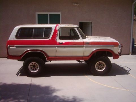 1978 Ford Bronco - This classic 1978 Ford Bronco is shown in a side profile, a two-tone paint scheme and off-road tires.