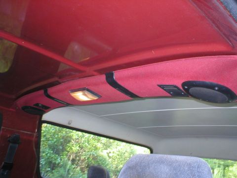 1986 Ford Bronco - Interior view of a 1986 Ford Bronco, highlighting the overhead console with a light and speaker.