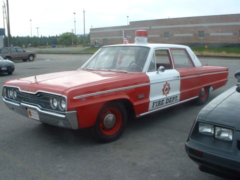 1999 Ford Crown Victoria - This vintage Dodge sedan has been converted into a fire department vehicle.