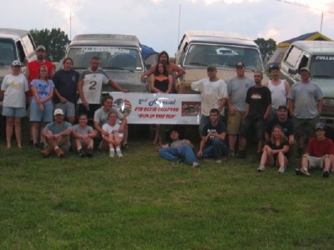 1994 Ford Bronco - A group poses with their trucks, some of which appear to be from the 1980s.