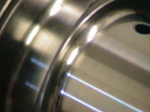1979 Ford Bronco - Detail shot of a wheel rim, showing its construction and finish.