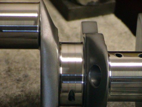 1979 Ford Bronco - Close-up of a metal crankshaft, a critical engine component.