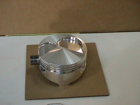 1979 Ford Bronco - A single polished aluminum piston is shown, designed for an engine build.