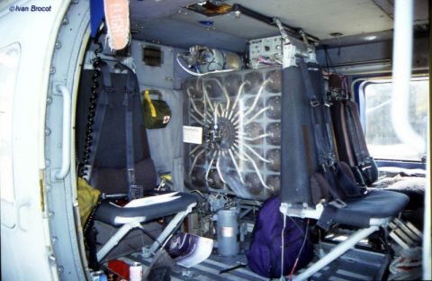 1993 Ford Bronco - Interior view of a helicopter cabin, showing seating and equipment.