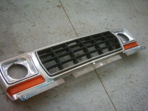 1978 Ford Bronco - Front grille assembly from a 1978 Ford Bronco, orange turn signal lights.