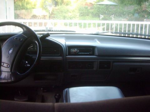 1978 Ford Bronco - Interior view of a vehicle's dashboard, showing the steering wheel and center console.