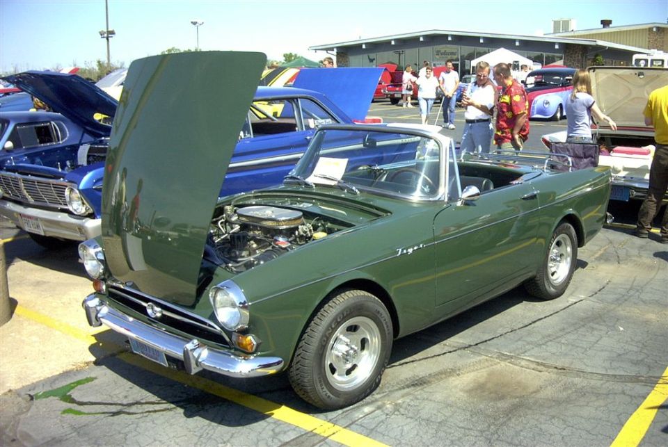 How about one of these? Imagine a car with the weight of an MG with the power of a V-8 Mustang... The 1965 Sunbeam Tiger. Powered by Ford.