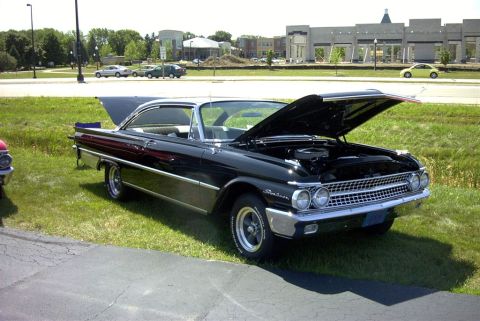 1967 Ford LTD - This classic Ford has its hood up, revealing the engine bay.