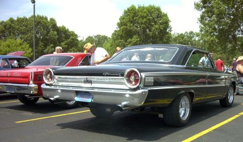1967 Ford LTD - Rear view of a black 1963 Ford Galaxie 500 at a car show.