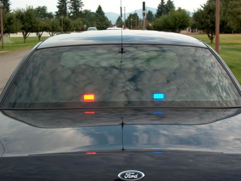 2001 Ford Crown Victoria - Rear view of a 2001 Ford Crown Victoria, equipped with interior emergency lights.