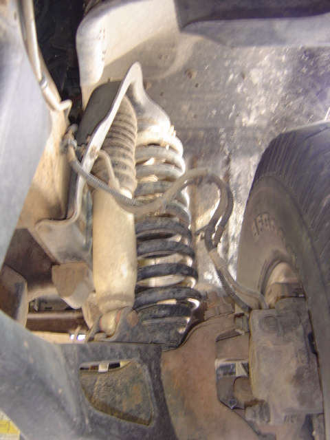 1996 Ford Bronco - The front coil and dual shocks... and the tire. and other stuff. I was bored.