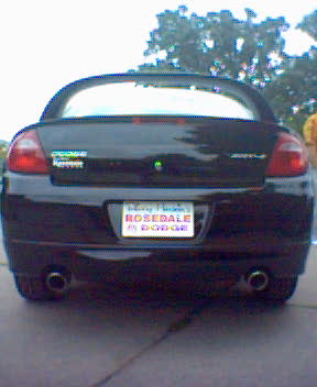 2004 Dodge SRT-4 - Rear view of a black Dodge SRT-4, identified as a 2004 model, dual exhaust pipes and a Rosedale license plate.