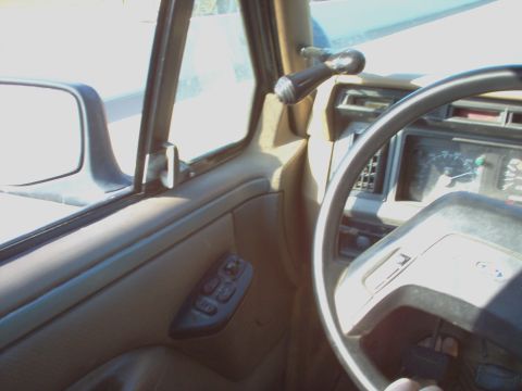 1983 Ford Bronco - This is a '94 EB door panel on an '82 door with a '95 vent window and a '95 mirror. The door glass is probably '83. To fit the panel, the a…