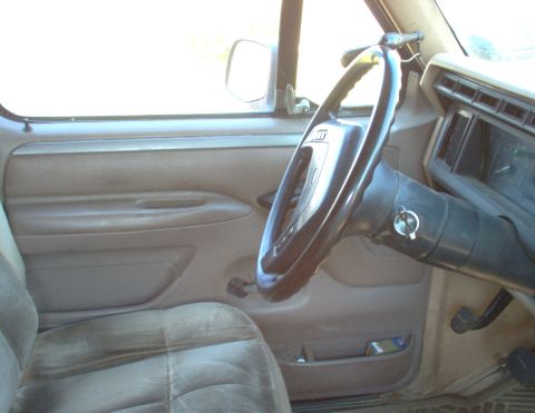 1983 Ford Bronco - A wider shot. The spotlight is a Unity from a cop car, the steering column is from an '83 pickup, the steering wheel is an '87, and the sea…
