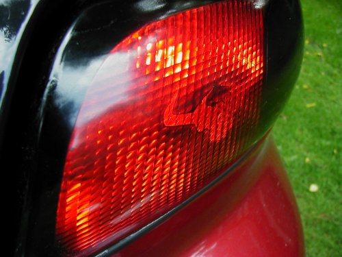 Red tail light on a 1997 Ford Taurus