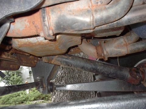 1986 Ford Bronco - Passenger side view of collectors and custom pipe work to route exhaust. Plenty of room here between braces and collector flange.