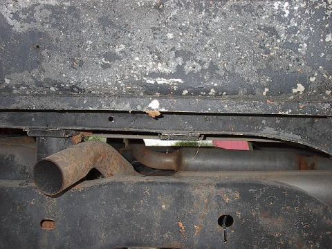 1986 Ford Bronco - I have a 3" body lift and routed the pipes and mufflers in the space created by the body lift. Here is the exhaust exiting in the rear fend…