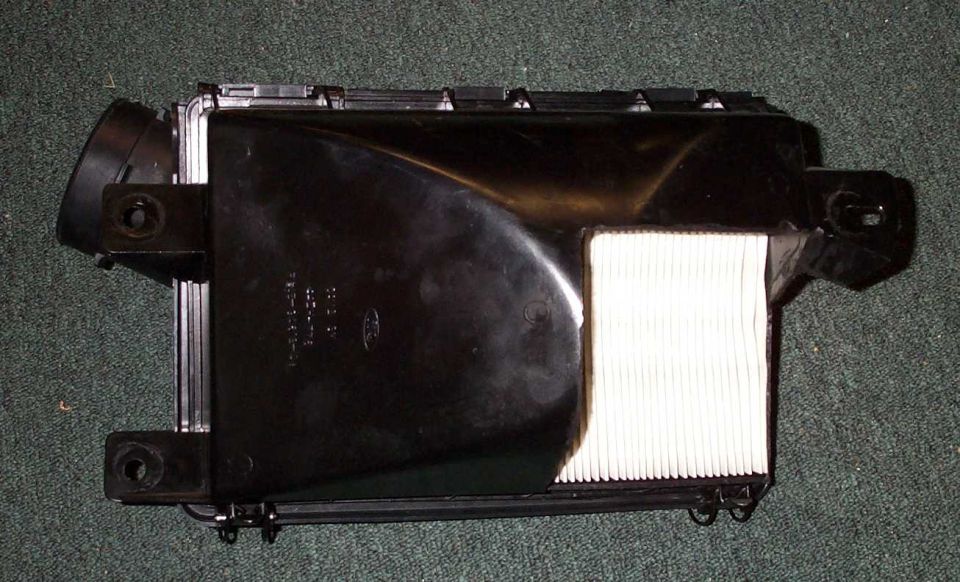 Here's some pics of the airbox after it was further gutted. I have since switched to a Marauder airbox and MAF.