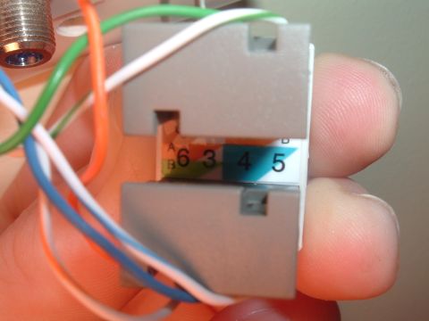 2000 Honda Accord - A close-up of a network connector with wires and numerical labels, alongside a SuperMotors watermark.