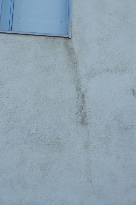 1990 Ford Bronco - Stucco cracks below upstairs window