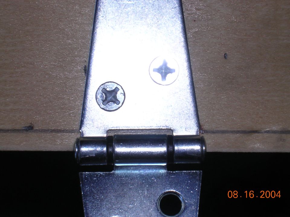 i learned the hard way that the hing needs to be right on the edge to allow the shelf to fold up.  It still has some clearance probs, but this is going to cover my amps and an inverter, so I dont need to get to it very often.