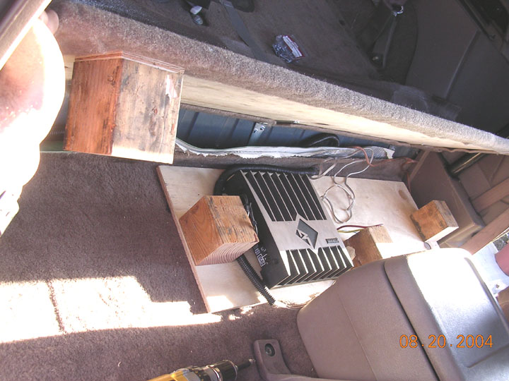 I made a deck, that will hold both amps (when I am done) on one side, and secured the shelf supports to the deck.  the deck is secured to the floor board.  On the passenger side, i just screwed the support to the lid
