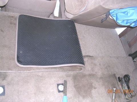 1994 Ford Bronco - The shelf in, with the rear carpeting on top of the seam, instead of down the ledge, and the carpeted fllor mat I have. You can barely tell…