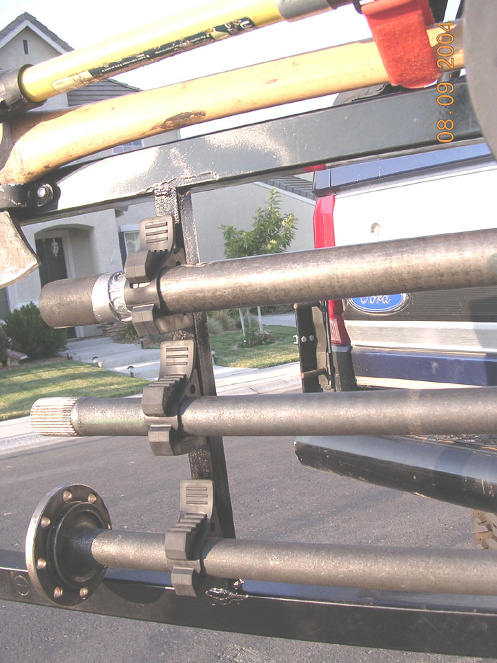 They can hold axle shafts, my 8 pound sledge, and hi lifts with ease.   Im assured that sun and weather will not harm them anymore than they would tires on your car.  Only time will tell.