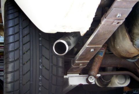 1978 Ford Mustang II - This photo shows the underside of a vehicle, focusing on the rear suspension components and exhaust system.