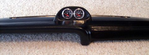 1978 Ford Mustang II - Dashboard section with dual gauges is shown against a carpeted background.
