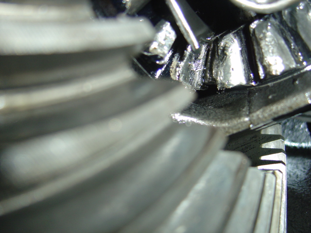 Differential gears with visible wear and lubricant