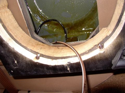 1986 Ford Bronco - By making the plywood hole a little bigger I was able to get access to drill holes in the 2" X 12" allowing me to use the stock 5" X 7" spe…