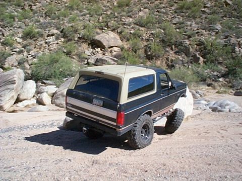 1994 Ford Bronco - This Ford Bronco is navigating a rocky, off-road trail.