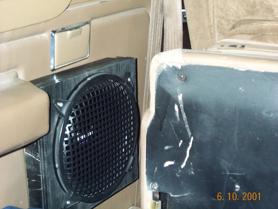 10" subwoofers into the rear using the stock 5" X 7" speaker holes, no cutting or hatchet work required !