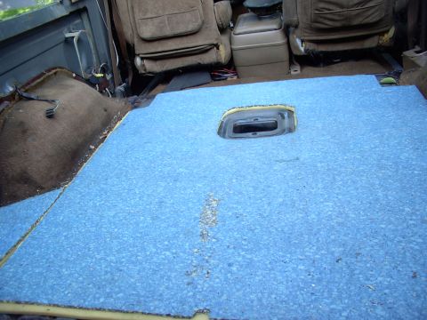 1986 Ford Bronco - I'm using two layers of different carpet underlay under the rug which makes it real comfy to lie on when the tailgate tent is used. It prob…