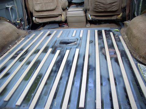 1986 Ford Bronco - The stock cardboard inserts were real soggy last time so I just had Home Depot slice me up some 1/4" masonite into strips and it works beau…