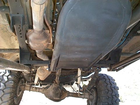 1994 Ford Bronco - This photo shows the undercarriage of a 4x4 vehicle, including its exhaust and suspension components.