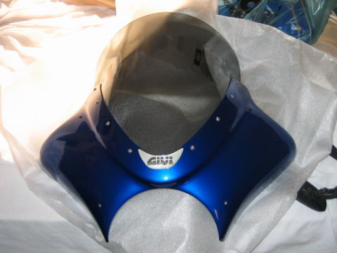 1985 Ford Crown Victoria LTD - A blue motorcycle fairing with a smoked windscreen is shown, a GIVI logo on the front.