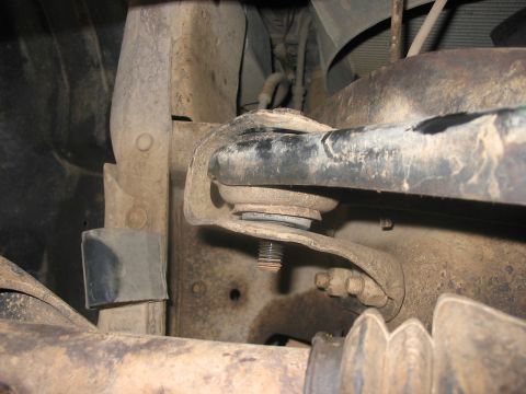 1988 Ford Bronco - Undercarriage view of suspension parts, the SuperMotors logo at the bottom right.